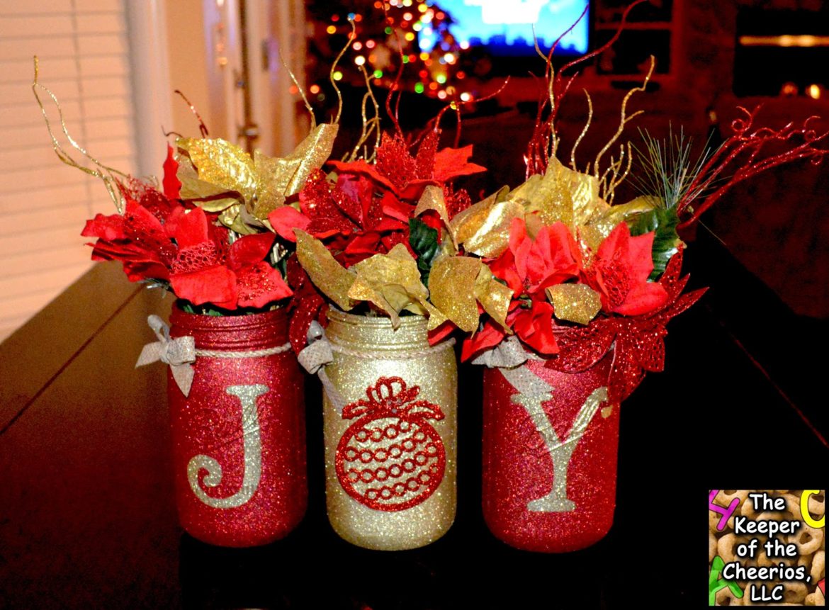 Beautifully decorated DIY mason jar Christmas crafts with festive holiday ornaments and fairy lights.