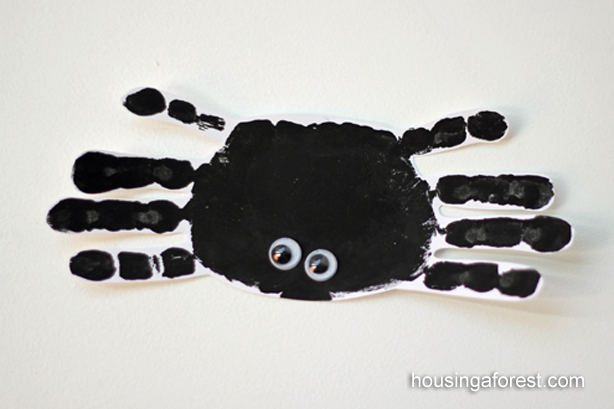 Simple Handprint Spider ~ marble painted spider web and green frame.