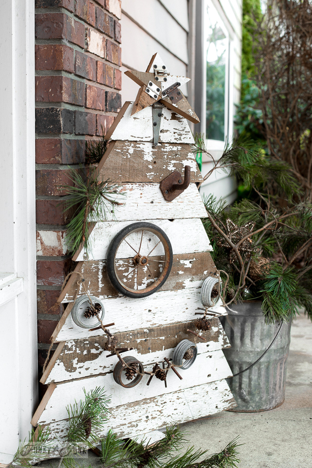 Reclaimed wood Christmas tree and star in chippy white boards for a front porch / funkyjunkinteriors.net