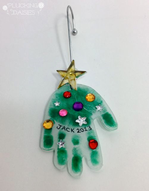 Holiday Handprint Charms : A fun craft for kids, use them to make ornaments or heartfelt holiday gifts! | PluckingDaisies.com